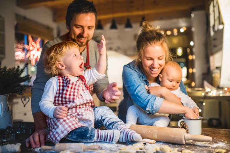 6 Ways Your Furnace Keeps You Safe. Family happily baking together.