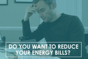 Image of someone with their head in their hand. Video - Do You Want to Reduce Your Energy Bills?