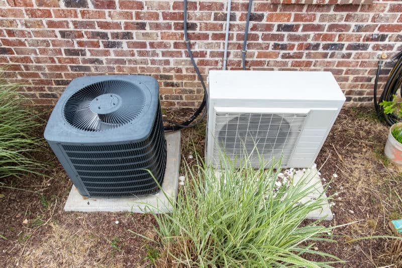 Ductless Mini-Split Outdoor Unit Installed Beside a Residential Property in Mukwonago, WI